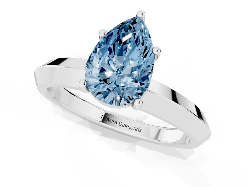 Fancy Blue Pear Cut Diamond Solitaire Engagement Ring Set in Silver with Flat Band and Prong Setting