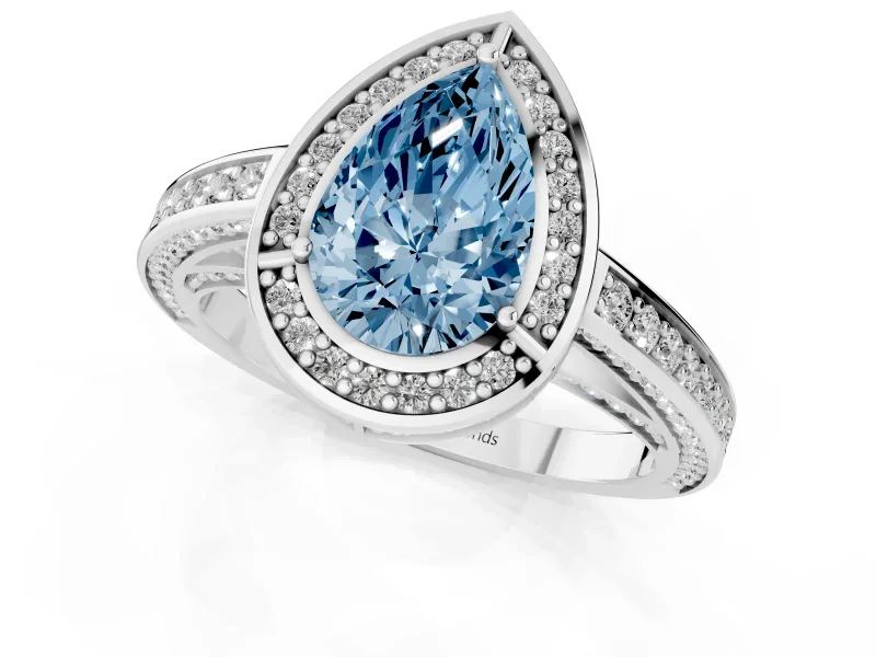 Fancy Blue Pear Cut Diamond Halo Pavé Split Shank Ring Set in Platinum with Prong Setting