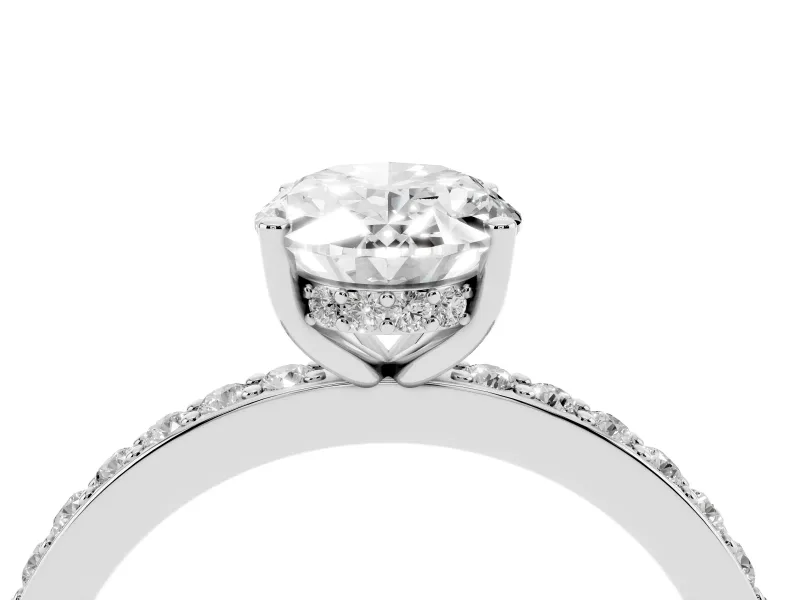Oval Cut Diamond Pavé Band Ring Set in White gold with Prong-Set Center Stone