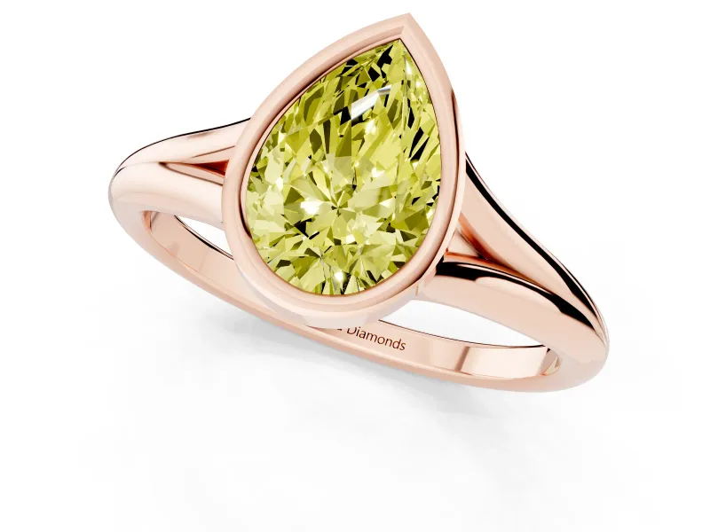 Fancy Yellow Bezel Set Pear Cut Diamond Solitaire Ring Set in Rose gold with Tapered Band