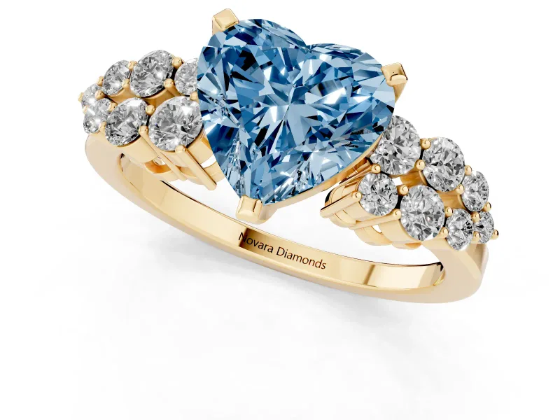 Heart-Shaped Side Stone Engagement Ring Setting for a Fancy Blue Lab-Grown Diamond | Shoulder Clusters | Yellow Gold