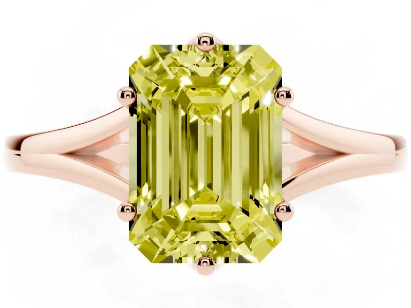 Fancy Yellow Emerald Cut Diamond Solitaire Ring Set in Rose gold with Polished Tapered Band and Prong Setting