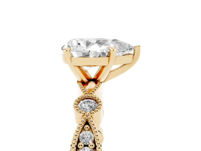 Pear Cut Diamond Solitaire Engagement Ring Set in Yellow gold with Milgrain Bezel Accent Band