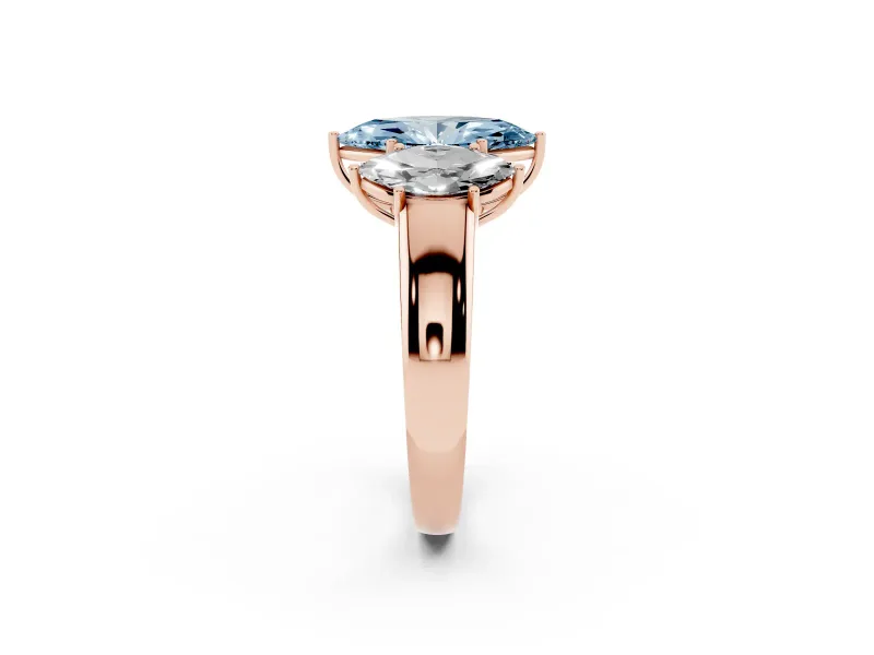 Fancy Blue Three-Stone Marquise Cut Diamond Ring Set in Rose gold with Matching Prong Settings and Plain Band
