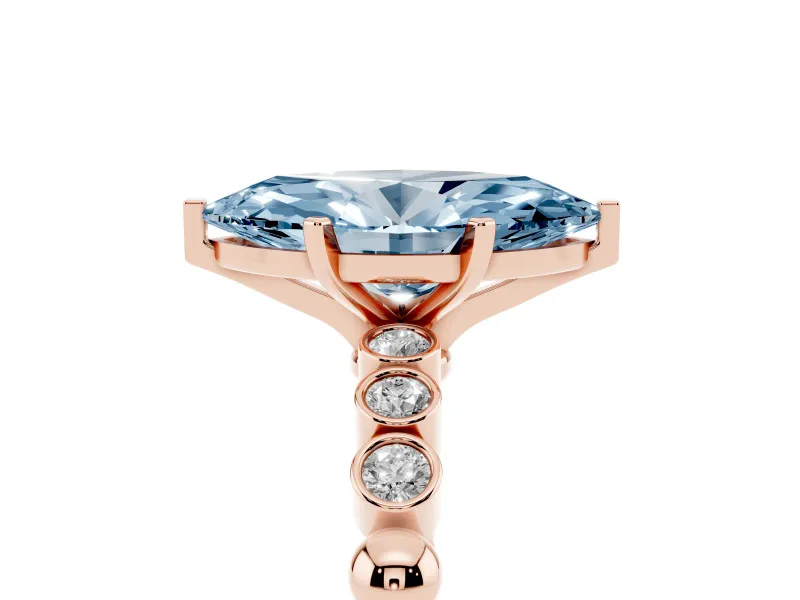 Fancy Blue Marquise Cut Diamond Solitaire Engagement Ring Set in Rose gold with Bezel Accents on Beaded Band