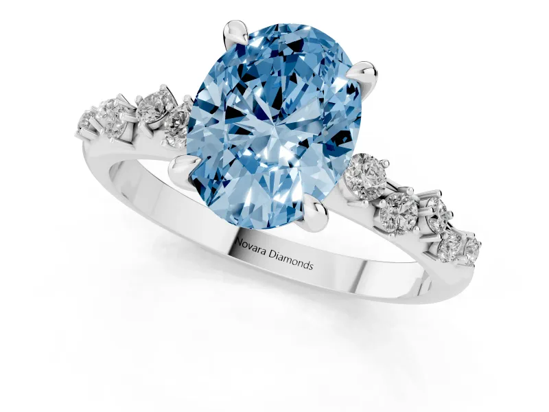 Fancy Blue Oval Cut Diamond Solitaire Vine Band Ring Set in White gold with Round Accents and Prong Setting