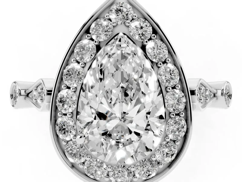 Pear Cut Diamond Halo Engagement Ring Set in White gold with Twisted Band and Prong Setting