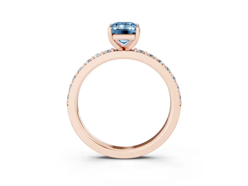 Fancy Blue Emerald Cut Diamond Solitaire Set in Rose gold with Round Pavé Band and Prong Setting