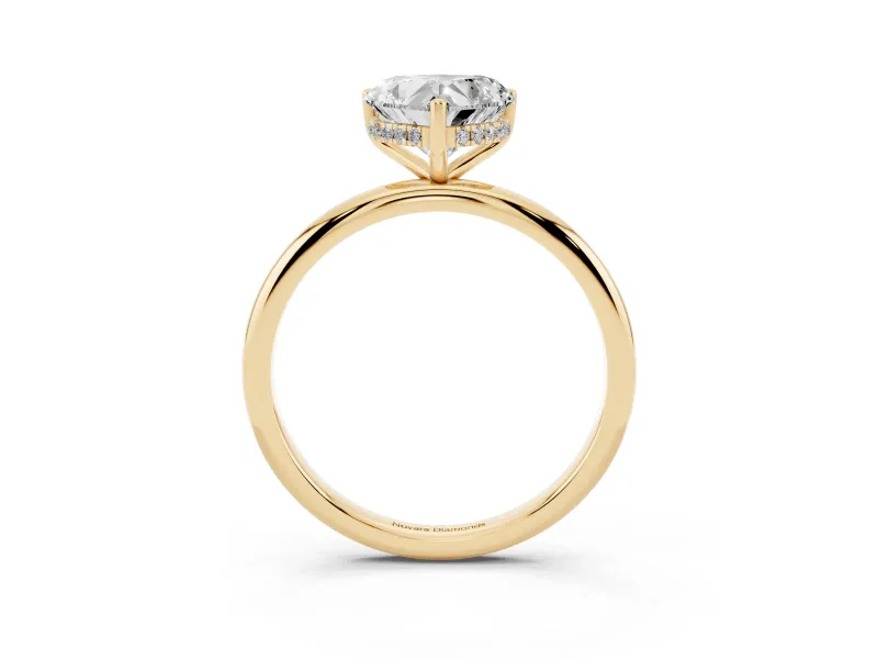 Heart Cut Diamond Solitaire Engagement Ring Set in Yellow gold with Prong Setting and Polished Band