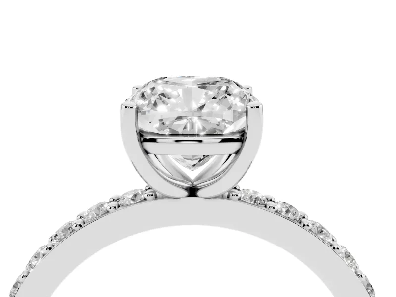 Cushion Cut Diamond Solitaire Set in White gold with Round Pavé Band and Prong Setting