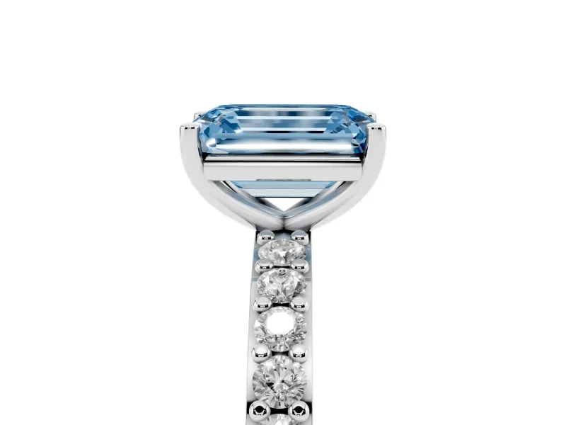 Fancy Blue Emerald Cut Diamond Solitaire Set in White gold with Round Pavé Band and Prong Setting
