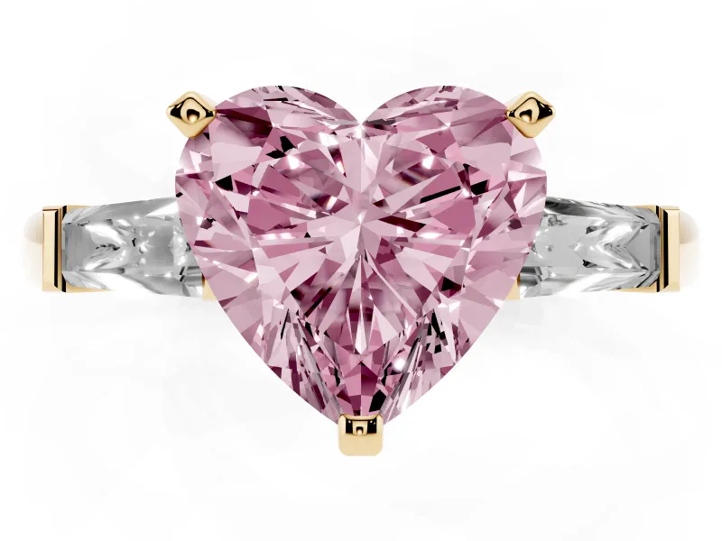 Fancy Pink Heart Cut Diamond Solitaire Ring Set in Yellow gold with Tapered Baguette Side Stones and Prong Setting