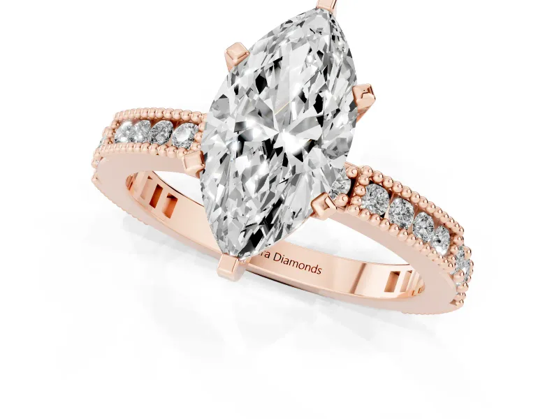 Marquise Cut Diamond Solitaire Ring Set in Rose gold with Slim Pavé Band and Prong Setting