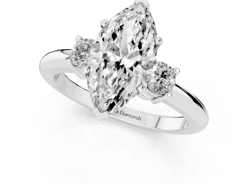Three-Stone Marquise Cut Diamond Ring Set in Platinum with Prong Setting and Plain Band