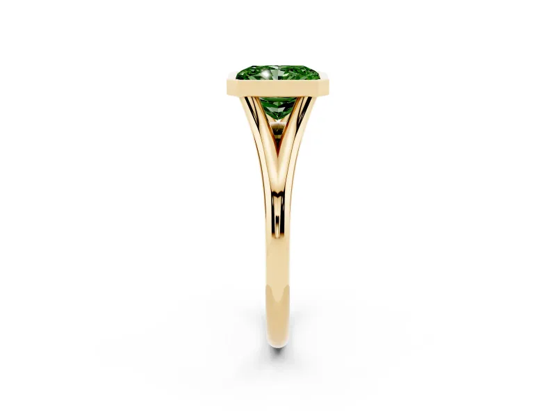 Fancy Green Bezel Set Radiant Cut Diamond Solitaire Ring Set in Yellow gold with Tapered Band