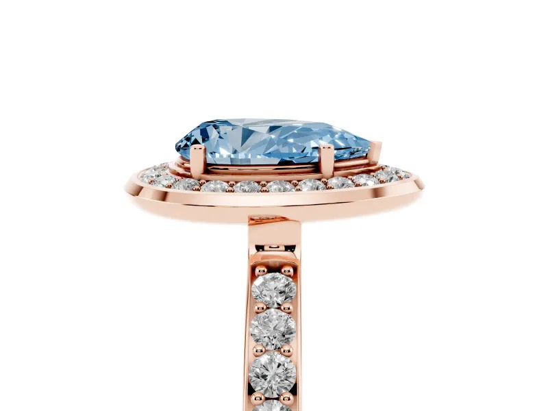 Fancy Blue Pear Cut Diamond Halo Ring Set in Rose gold with Bezel Frame and Pavé Band
