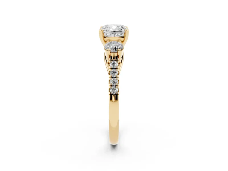 Three-Stone Cushion Cut Diamond Pavé Band Ring Set in Yellow gold with Prong-Set Trio