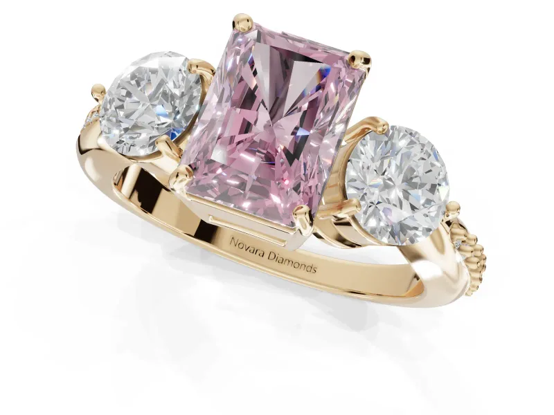 Radiant Cut Three Stone Engagement Ring Setting for a Fancy Pink Lab-Grown Diamond | Tapered Pave Band | Yellow Gold