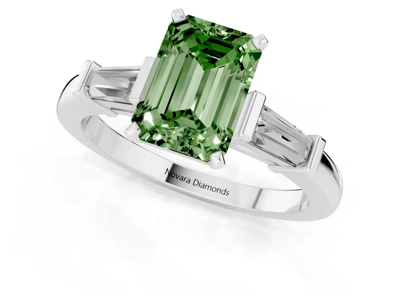 Fancy Green Emerald Cut Diamond Solitaire Ring Set in Platinum with Tapered Baguette Accents and Prong Setting