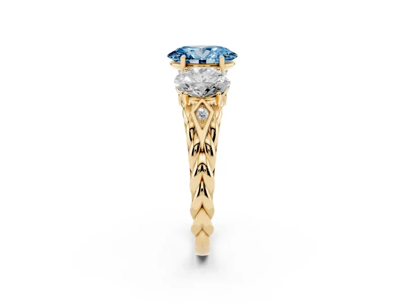 Fancy Blue Oval Cut Diamond Three-Stone Ring Set in Yellow gold with Braided Band