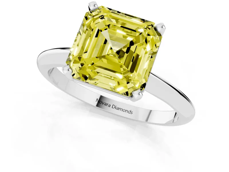 Fancy Yellow Asscher Cut Diamond Solitaire Ring Set in Platinum with Prong Setting on a Plain Round Band