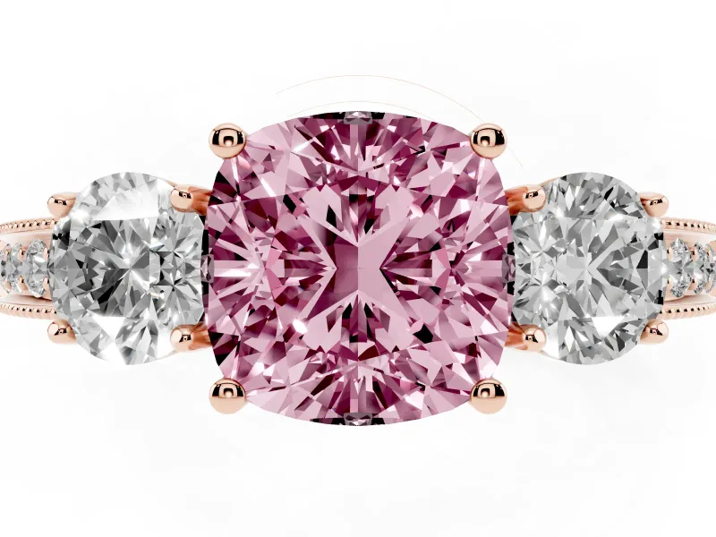 Fancy Pink Cushion Cut Diamond Three-Stone Ring Set in Rose gold with Round Side Stones and Pavé Band