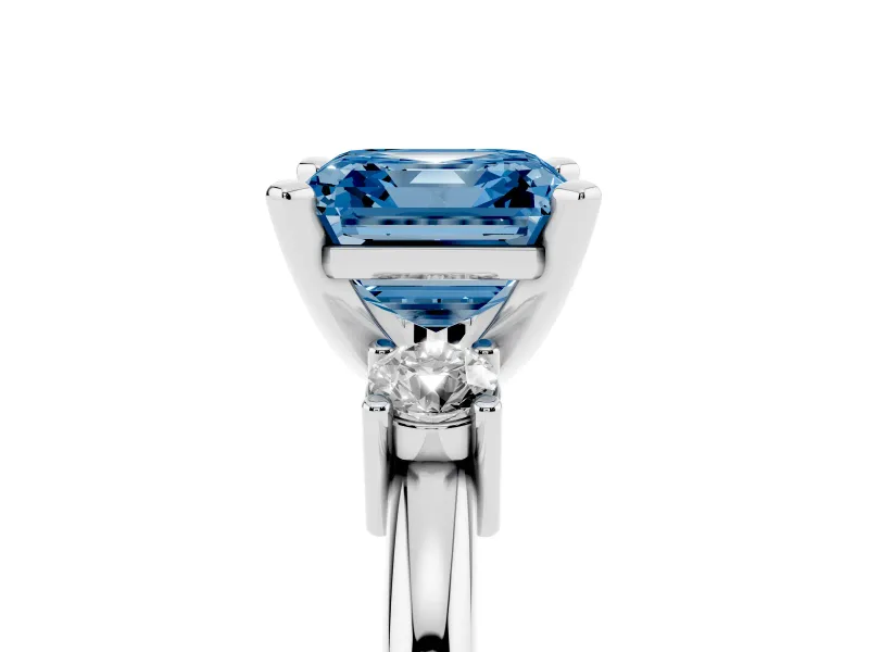 Fancy Blue Three-Stone Asscher Cut Diamond Ring Set in Silver with Prong Setting and Plain Band