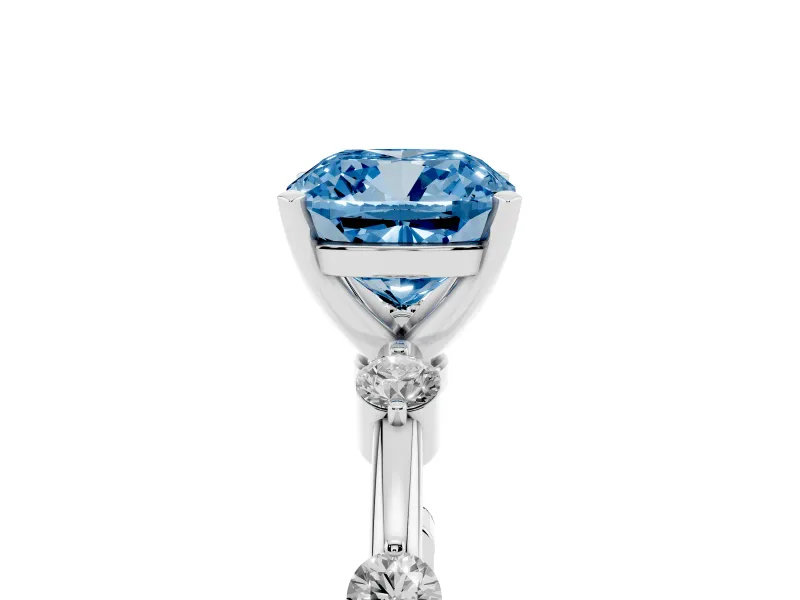 Fancy Blue Cushion Cut Diamond Solitaire Ring Set in Silver with Bezel Set Side Stones and Prong Setting