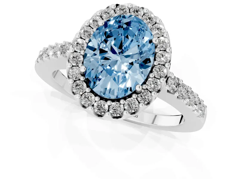 Fancy Blue Oval Cut Diamond Halo Pavé Solitaire Ring Set in Platinum with Prong-Set Center Stone