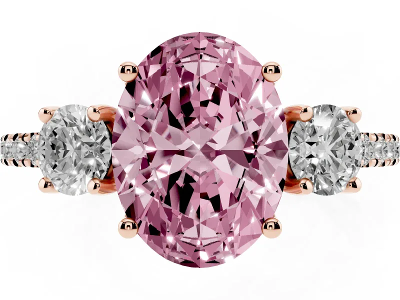 Fancy Pink Oval Cut Diamond Three-Stone Ring Set in Rose gold with Pavé Band and Graduated Sides