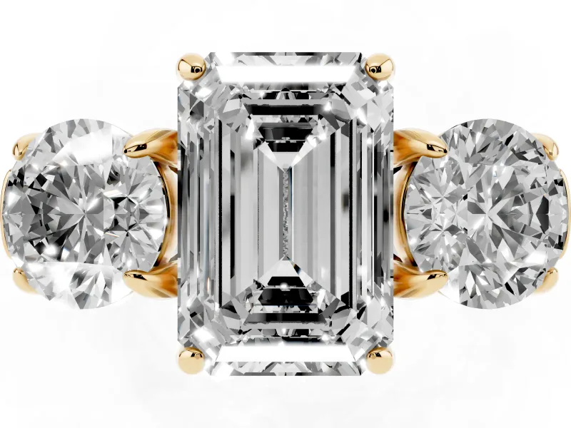 Emerald Cut Diamond Three-Stone Ring Set in Yellow gold with Round Accent Stones and Plain Band