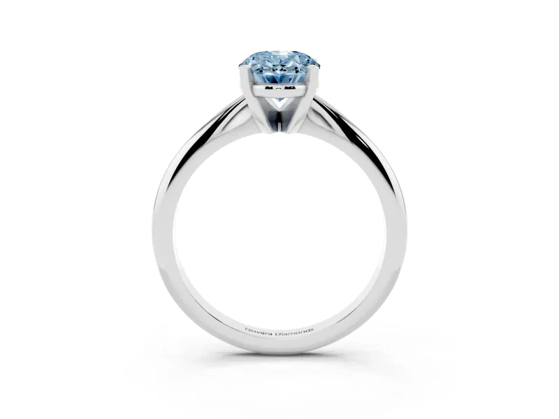 Fancy Blue Oval Cut Diamond Solitaire Ring Set in White gold with Prong Setting on a Plain Round Band