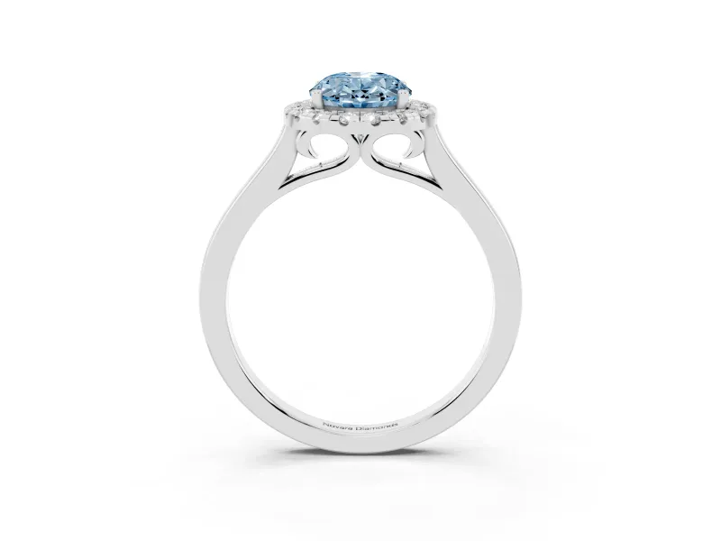 Fancy Blue Oval Cut Halo Round Diamond Solitaire Ring Set in Silver with Pavé Band and Prong Setting