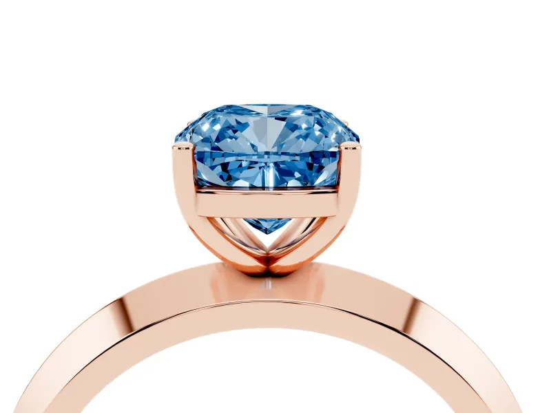 Fancy Blue Cushion Cut Diamond Solitaire Engagement Ring Set in Rose gold with Flat Band and Prong Setting