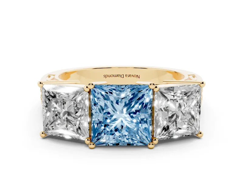 Fancy Blue Princess Cut Diamond Three-Stone Ring Set in Yellow gold with Textured Band