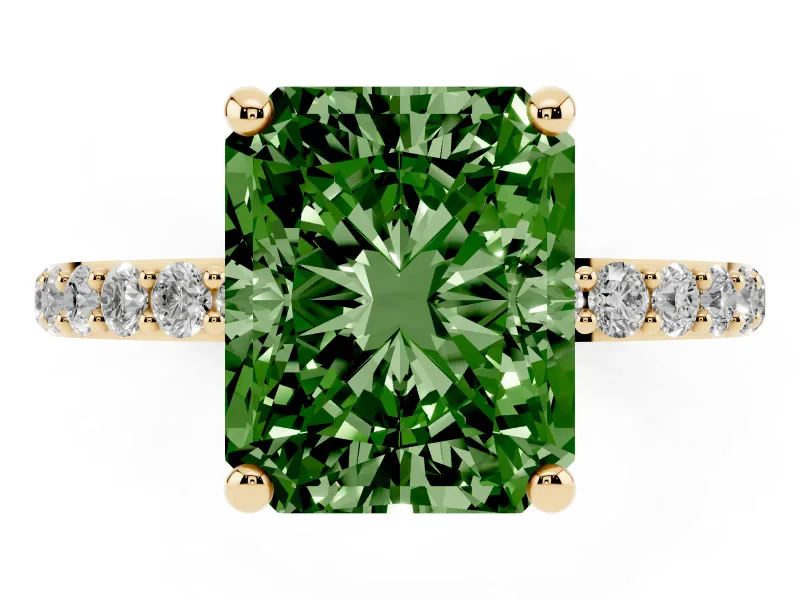 Fancy Green Radiant Cut Diamond Solitaire Ring Set in Yellow gold with Round Pavé Band and Prong Setting