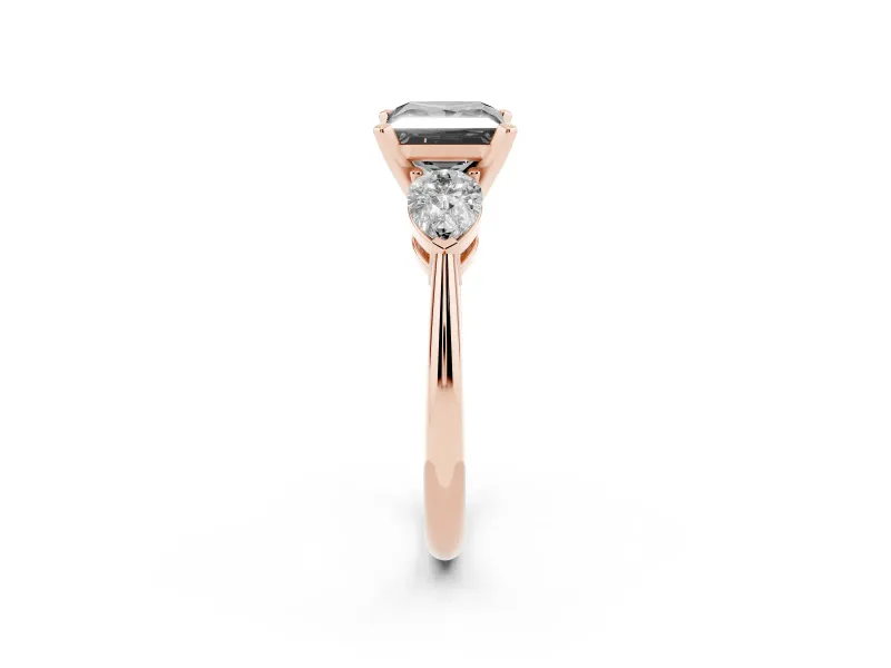 Fancy Black Three-Stone Princess Cut Diamond Ring Set in Rose gold with Pear Side Stones and Prong Setting