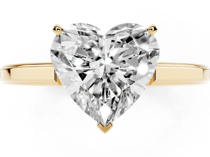 Heart Cut Diamond Solitaire Ring Set in Yellow gold with Prong Setting and Classic Band