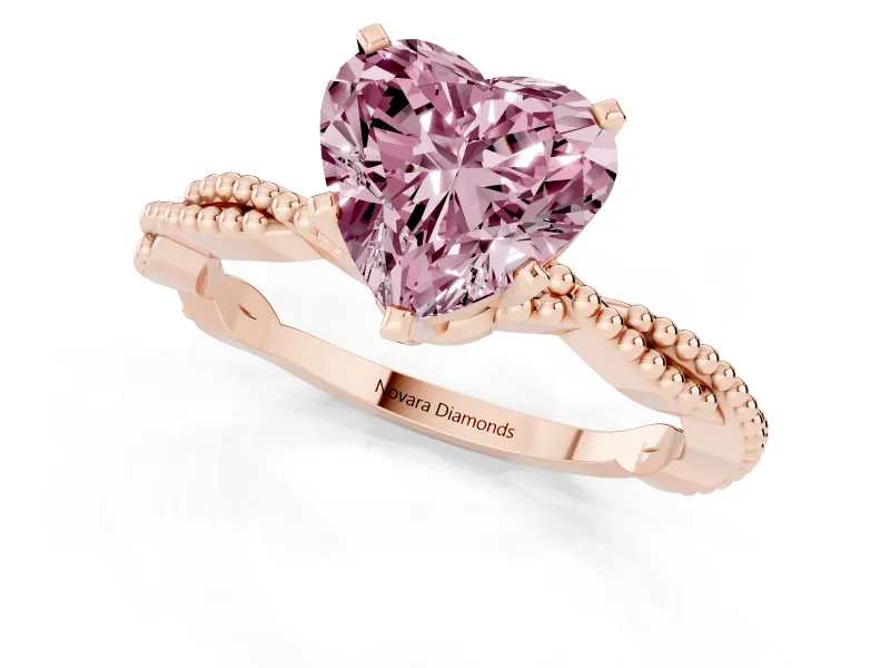 Fancy Pink Heart Cut Diamond Solitaire Ring Set in Rose gold with Twisted Band and Bead Prong Setting