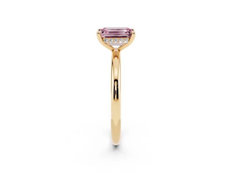 Fancy Pink Emerald Cut Diamond Solitaire Ring Set in Yellow gold with Thin Band and Prong Setting
