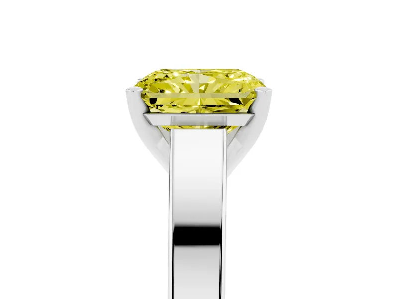 Fancy Yellow Radiant Cut Diamond Solitaire Engagement Ring Set in Platinum with Prong Setting and Tapered Band