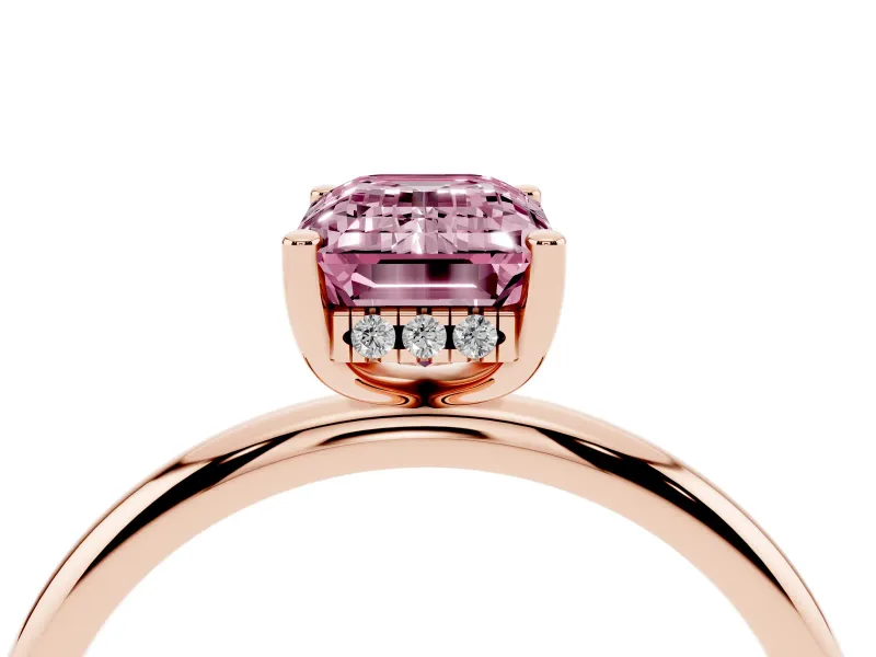 Fancy Pink Emerald Cut Diamond Solitaire Engagement Ring Set in Rose gold with Prong Setting and Polished Band