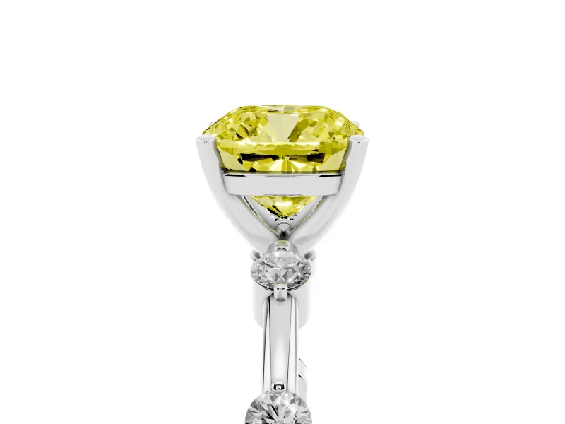 Fancy Yellow Cushion Cut Diamond Solitaire Ring Set in Platinum with Bezel Set Side Stones and Prong Setting