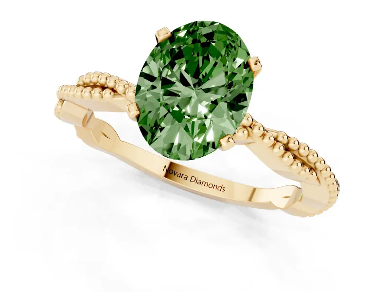 Fancy Green Oval Cut Diamond Solitaire Ring Set in Yellow gold with Twisted Band and Bead Prong Setting