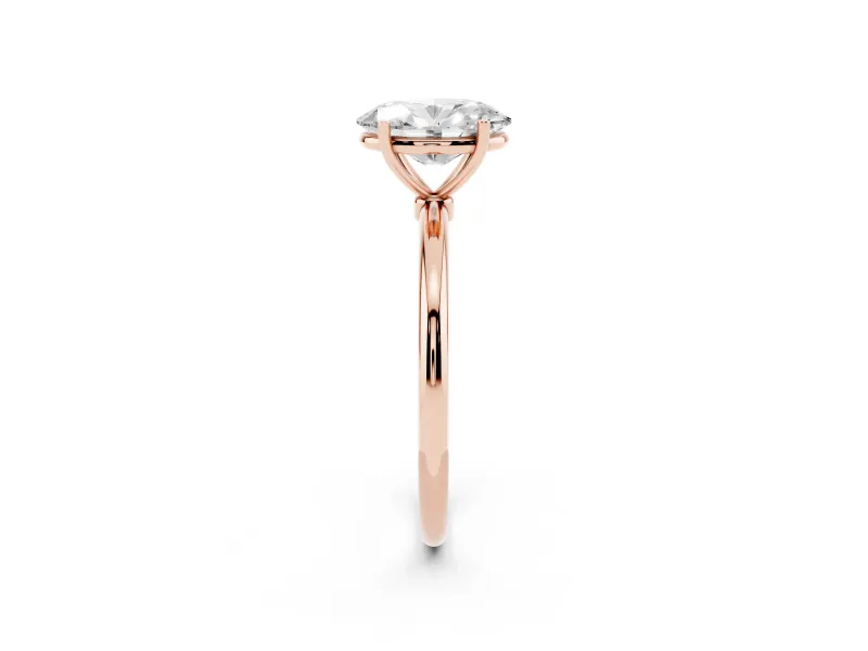 Oval Cut Diamond Solitaire Engagement Ring Set in Rose gold with Thin Band and Prong Setting