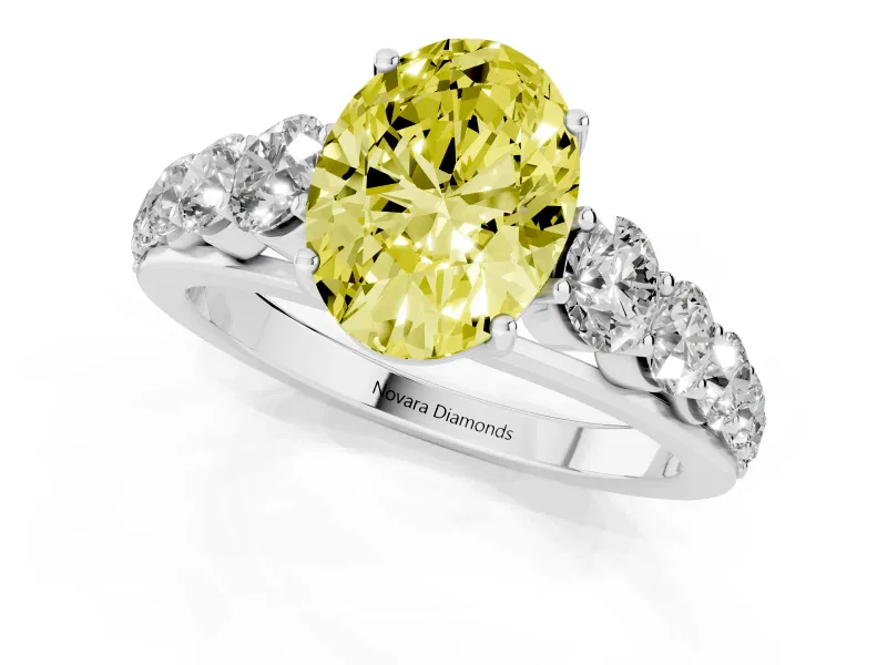 Oval Graduated Side Stone Engagement Ring Setting for a Fancy Yellow Lab-Grown Diamond | Flat Top Band | Platinum