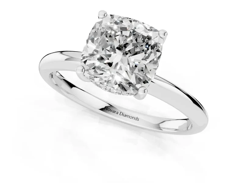 Cushion Cut Diamond Solitaire Engagement Ring Set in White gold with Prong Setting and Polished Band