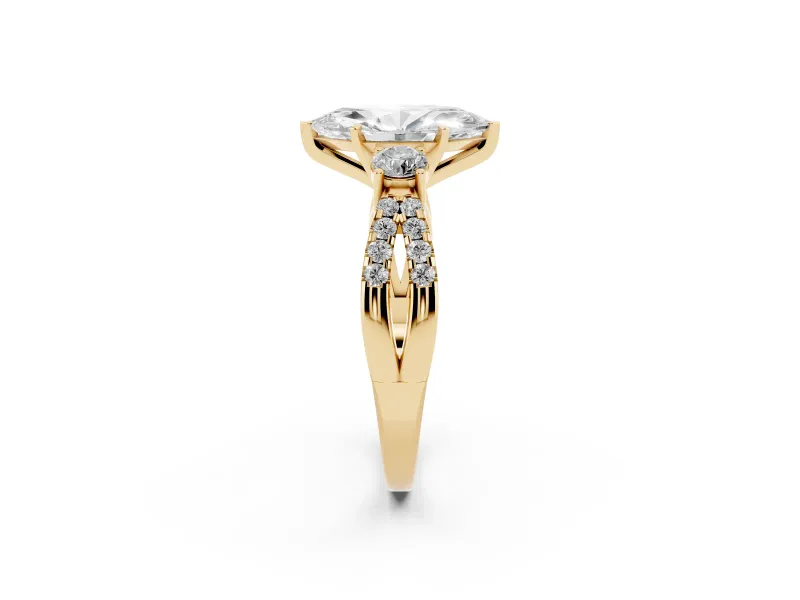 Marquise Cut Diamond Three-Stone Ring Set in Yellow gold with Pavé Split Shank and Prong Setting