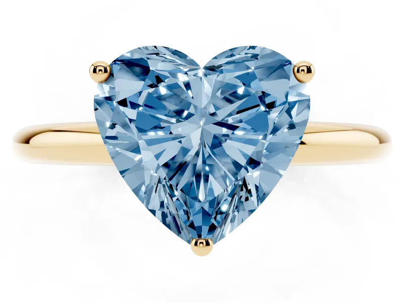 Fancy Blue Heart Cut Diamond Solitaire Engagement Ring Set in Yellow gold with Prong Setting and Polished Band