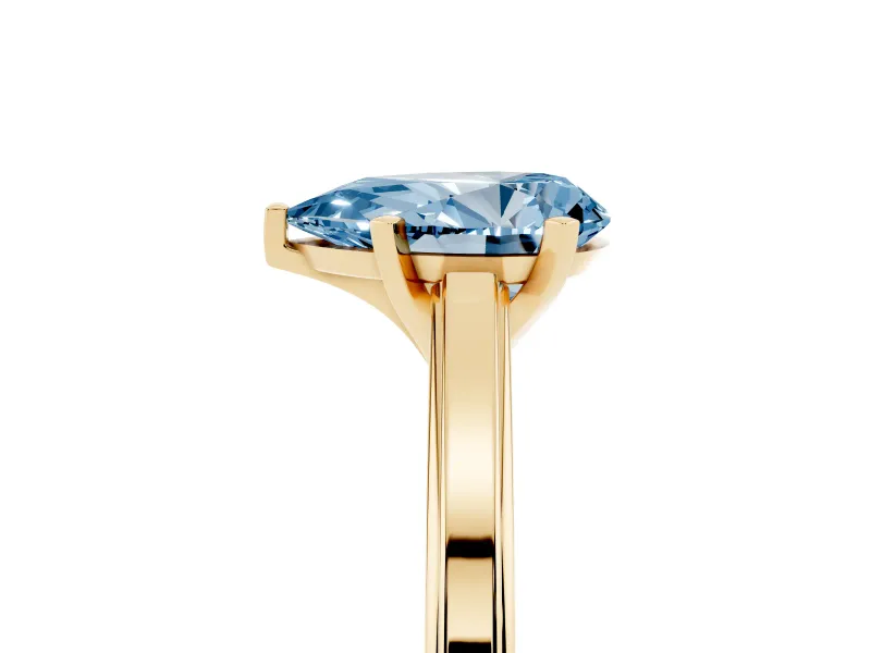 Fancy Blue Pear Cut Diamond Solitaire Ring Set in Yellow gold with Prong Setting and Classic Band